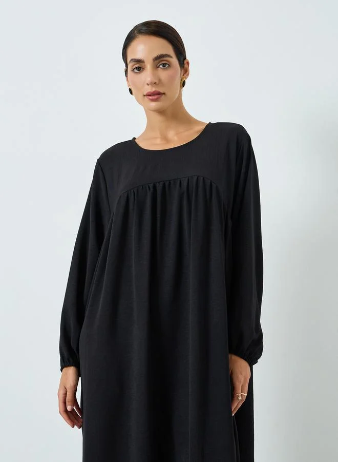 تايك تو جلابية سوداء بياقة مستديرة وكسرات